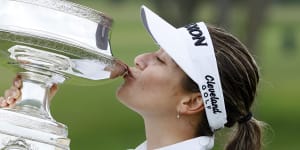 Hannah Green kisses the trophy after her major victory.