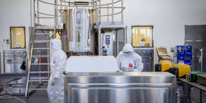 Staff at CSL in Melbourne prepare to manufacture the AstraZeneca-Oxford University COVID-19 vaccine.