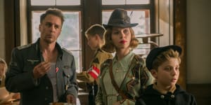 Sam Rockwell (left),Scarlett Johansson and Roman Griffin Davis in Jojo Rabbit. 
