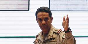 Saudi military spokesman Colonel Turki al-Malki displays what he describes as an Iranian cruise missile and drones.