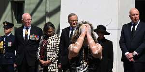 Governor-General David Hurley,Prime Minister Anthony Albanese and Opposition Leader Peter Dutton watch a member of the Yukembruk dance group perform.