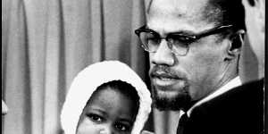 Malcolm X with his daughter,Ilyasah Shabazz in 1964.