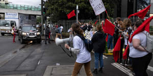 Students and staff picket an entry to Sydney University.