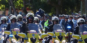 The police convoy - which featured motorbike,horses and dogs - during the final goodbye to Senior Constable Brett Forte in Toowoomba on June 7,2017.