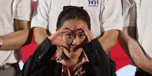 Paetongtarn Shinawatra gestures to supporters ahead of Sunday’s election.