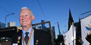 ‘I was 20 going on 16’:Korean War veterans lead Anzac Day march in sombre reflection