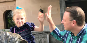 Brisbane City Council is pushing ahead with its budget which is likely to be handed down in mid-June. Pictured,seven-year-old Octavia Schrinner with her father lord mayor Adrian Schrinner/
