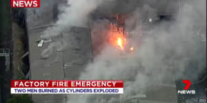 Two men seriously burnt after explosion at western Sydney factory