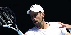 Novak Djokovic practices at Melbourne Park on Thursday,ahead of the Australian Open.