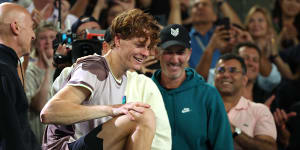 Jannik Sinner celebrates with coach Darren Cahill after the Italian’s Australian Open victory.
