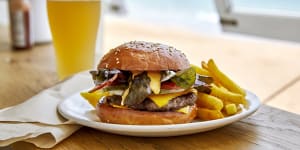 ***EMBARGOED FOR GOOD WEEKEND,FEBRUARY 11/23 ISSUE*** Good FoodÂ/ Good Weekend review by Callan Boys:Diner bacon burger at The Surf Deck in Collaroy Photograph by Jennifer Soo (photographer on contract,no restrictions)