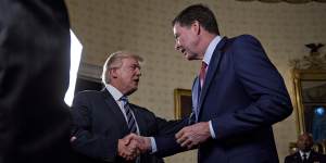 With Donald Trump who,four months into his presidency,sacked Comey.