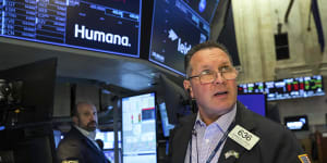 ASX falls as Wall Street slips after hitting milestone