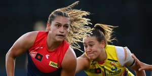 Melbourne’s Eliza West (left) in action during last year’s AFLW finals series.