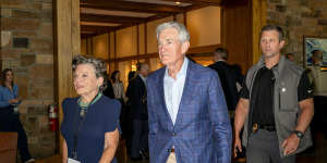 Jerome Powell and wife Elissa Leonard arrive at a dinner at the Jackson Hole symposium.