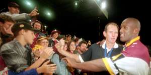 Wendell Sailor and Wayne Bennett celebrate after the 1997 grand final win.