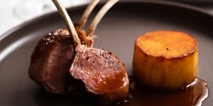 Lamb cutlets with fondant potato and jus.