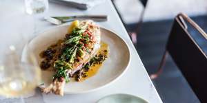 Whole baked snapper with chermoula and okra.