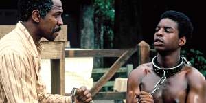 Louis Gossett as Fiddler (left),with Kunta Kinte (LeVar Burton) in the 1977 mini-series Roots.