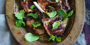 Barbecued lamb cutlets with spicy yoghurt sauce.