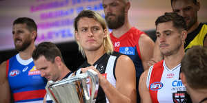 Collingwood captain Darcy Moore,with the premiership cup again in hand on Monday,says the Magpies are taking a more diligent approach to contact training.
