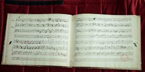 An original fragment of Wolfgang Amadeus Mozart’s handwritten music notebook on display in Paris.