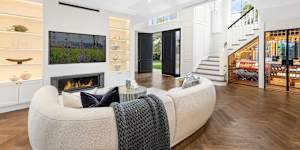 A family paid $7.85 million for a luxurious,modern French Provincial home in Pymble at Saturday’s auction. 