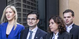 Surgeon Munjed Al Muderis and his barrister,Sue Chrysanthou,SC (second from right),outside the Federal Court in Sydney in September.