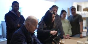 Owner Melissa Smith pours coffee brewed from tap water for US President Joe Biden in an East Palestine cafe.