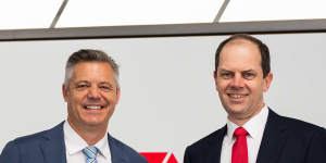 Outgoing and incoming Seven West Media chief executives James Warburton (left) and Jeff Howard.