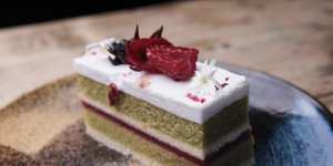 The hibiscus cake is a snowy symphony of basil olive oil sponge.