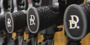 A row of AR-15 style rifles manufactured by Daniel Defense sit in a vault at the company’s headquarters in Black Creek,Georgia. 