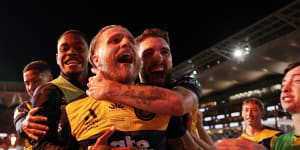 Jason Cummings and the Mariners celebrate a goal in the 2023 A-League Men’s decider at CommBank Stadium in Sydney.