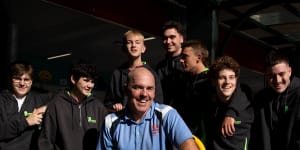 Andrew Horsley with Dapto High School students,is a mentor to the boys.