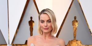 All white ... Margot Robbie in Chanel at the Oscars.