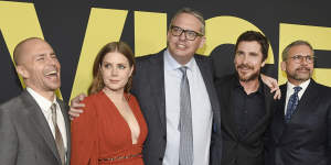 Adam McKay,centre,with the stars of Vice,from left:Sam Rockwell,Amy Adams,Christian Bale and Steve Carell.