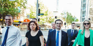 Barrister Sue Chrysanthou,SC,(left) surgeon Munjed Al Muderis and his partner,Claudia Roberts,in September 2023.