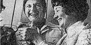 “Liberace toasts the blushing bride,Mrs L. Singer,at her airport wedding reception yesterday.”