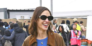 Alexa Chung wearing her vintage Barbour jacket at Glastonbury Festival in 2022.