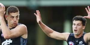 Liam Jones (left),playing for Carlton last year.