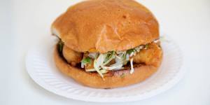 Battered flathead torta with coriander and salted cabbage.