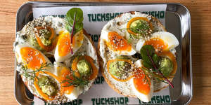 Soft-boiled egg bagel with avocado,dukkah and a caper and dill schmear at Comma Tuckshop,now open in Moorabbin.