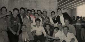 Denis O’Mara (with beer stein) in 1960 with workmates at the steps he helped to build at the Sydney Opera House.