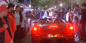 Lygon Street was taken over by Ferrari fans on Sunday night.