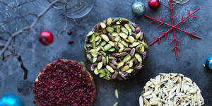 Decorate the Turkish delight rounds with nuts and dried fruit.