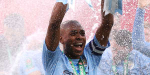 Fernandinho holds the Carabao Cup aloft for Manchester City after beating Tottenham Hotspur at Wembley.