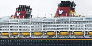The twin funnels of Disney Wonder with the iconic Mickey Mouse logo.