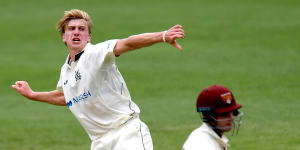 Will Sutherland of Victoria celebrates taking the wicket of Queensland's Jimmy Peirson during day two of their Shield clash at The Gabba.