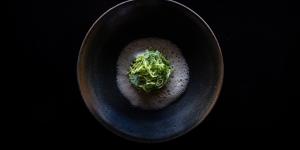 Lamb sweetbreads are served with cabbage,macadamia and fermented koji,which add nuttiness,funk and vegetal sweetness. 