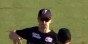 Sydney Sixers bowler Tom Curran runs at an umpire before a BBL match